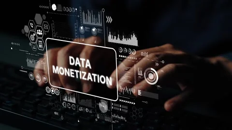 Hands Typing on Keyboard with Data Monetization Graphic Overlay and Digital Stock Footage 309980392