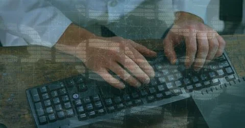 Hands typing on keyboard with digital data overlay, focusing on technology Stock Photos