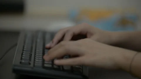 Hands typing on keyboard 库存影片 29227950
