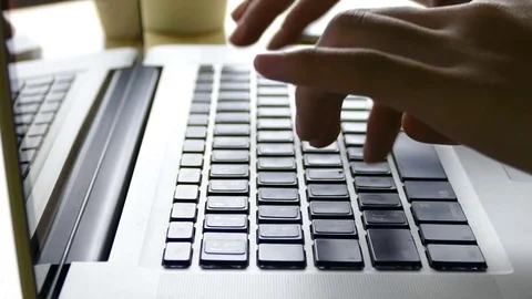 Hands typing on a keyboard. Stock Footage 76009650