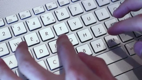 Hands typing on keyboard Stock Footage 77506878