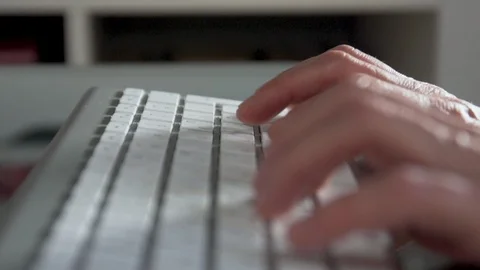 Hands typing at keyboard Stock Footage 91773290
