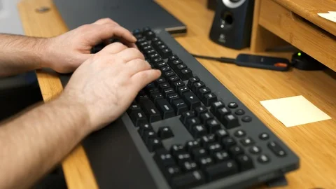 Hands typing on Keyboard Stock Footage 120613103