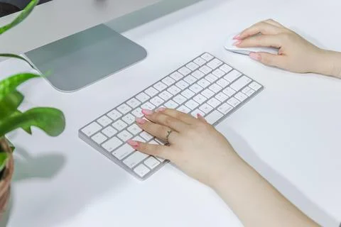 Hands typing on a keyboard, hands on keyboard Stock Photos
