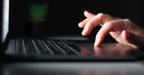 Hands typing keyboard night closeup. Late manager freelancer working computer Stock Footage 300363890