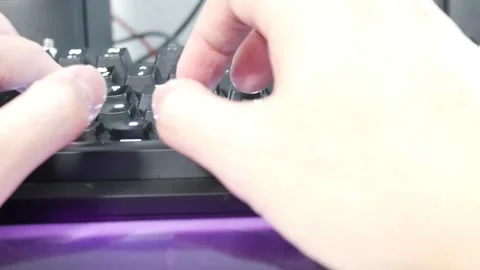 Hands typing on a keyboard panning to the left Stock Footage 252251198