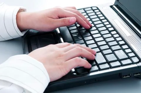 Hands typing on keyboard Stock Photos
