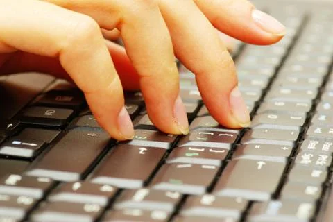 Hands typing on keyboard Stock Photos