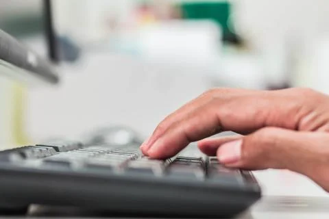 Hands typing on keyboard. Stock Photos