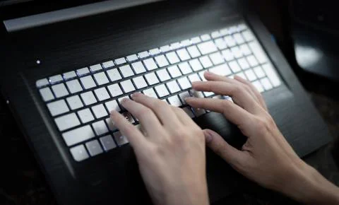 Hands typing on keyboard Foto stock