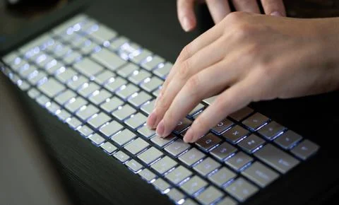 Hands typing on keyboard Stock Photos