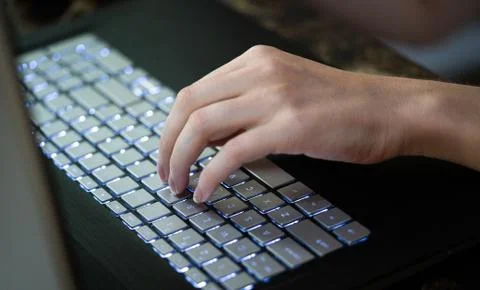 Hands typing on keyboard Foto stock