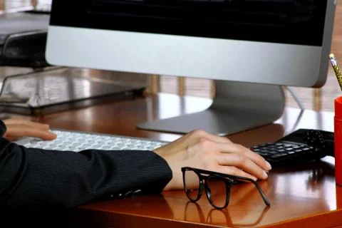 Hands typing on keyboard Foto stock