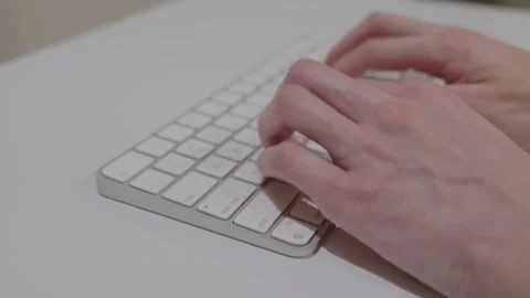 Hands typing on a keyboard for work, communication, or coding. Stock Footage 305125274
