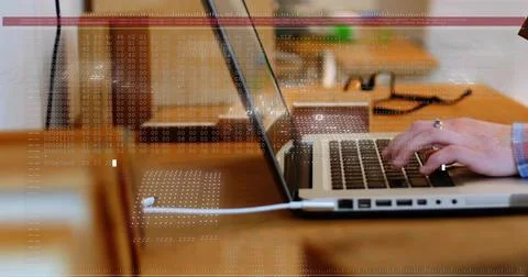 Hands typing on laptop at bar, reaching box, activating data overlay reflecting Stock Photos