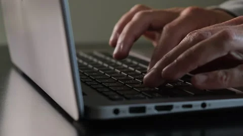 Hands typing on laptop close up work process minimal desk. Video stock 315118747