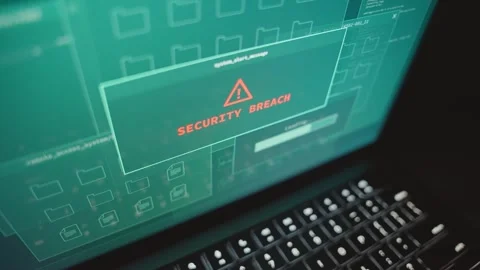 Hands typing on laptop computer when security alert pops on screen by system Vidéo 332790618