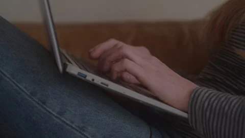 Hands Typing On Laptop On Couch Stock Footage 270327922