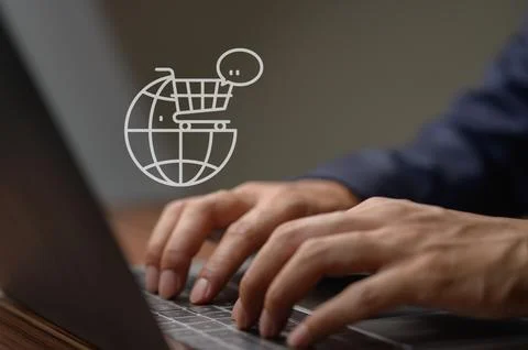 Hands Typing on Laptop with Ecommerce Icon for Online Shopping Concept Stock Photos