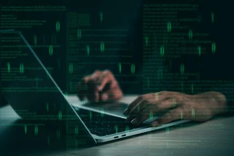 Hands typing on a laptop with floating code, representing coding and cybers.. Stock Photos