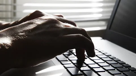 Hands typing on a laptop Stock-Footage 50654433