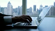  Hands Typing On Laptop Keyboard In Business Environment With Skyscrapers View Stock Footage