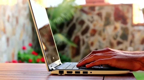 Hands Typing On A Laptop Keyboard Close Up 動画素材 64656499