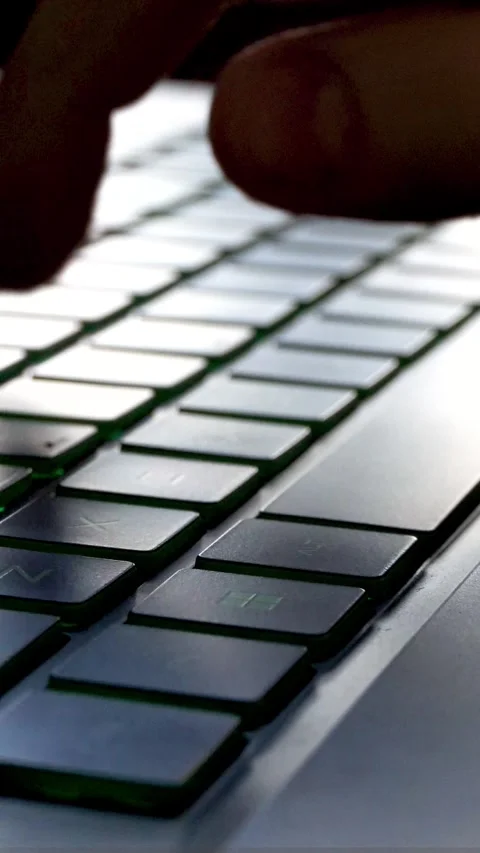 Hands typing on laptop keyboard in close up view Stock Footage 335829182