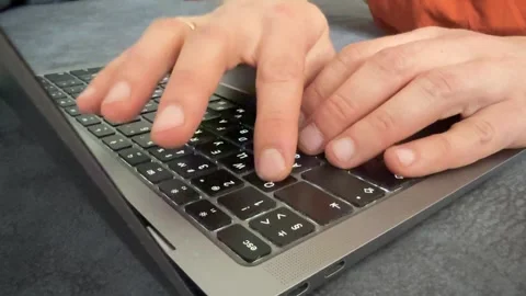 Hands typing on laptop keyboard close up, online work and computer productivity Video stock 337119854