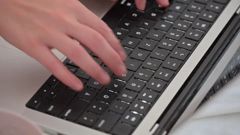 Hands Typing on Laptop Keyboard – Close-Up Stock Footage 345203997