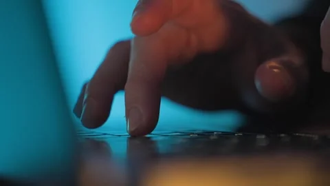 Hands typing on laptop keyboard, cyber attack and data breach concept Stock Footage 328350604