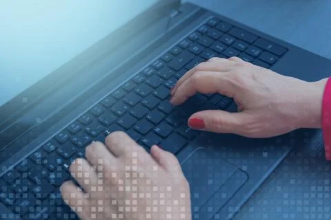 Hands typing on laptop keyboard with digital overlay, concept of cyber tech.. Stock Photos