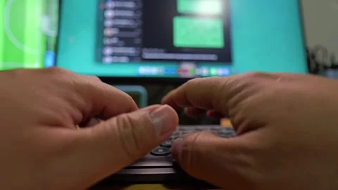 Hands typing on a laptop keyboard during a chat conversation. Stock Footage 321634614