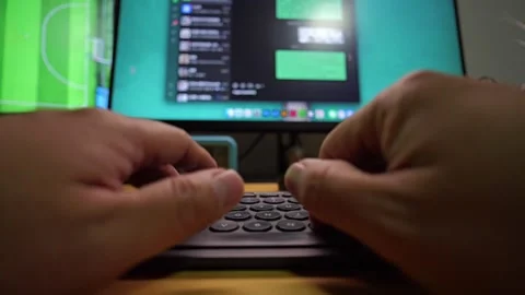 Hands typing on a laptop keyboard during a chat conversation. Stock Footage 321634615