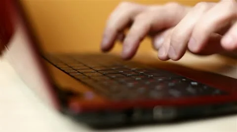 Hands typing on laptop keyboard Stock Footage 10679575