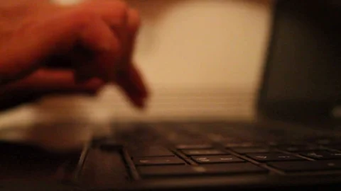 Hands typing on laptop keyboard Video stock 76464660