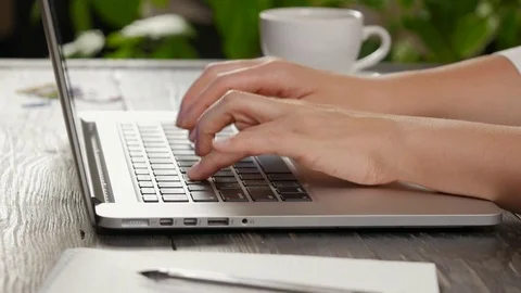 Hands typing at laptop keyboard Video stock 78720096