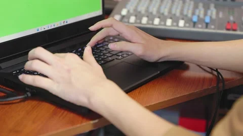 Hands typing on laptop keyboard Stock Footage 197266713