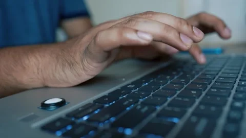Hands Typing on Laptop Keyboard, Hands on Keyboard Typing on Laptop at Offi.. Stock Footage 315982641