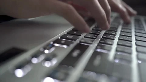 Hands Typing on Laptop Keyboard Remote Work Online Communication 4K Stockbeeldmateriaal 335188621