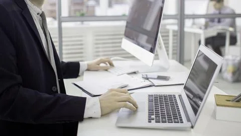 Hands Typing on Laptop Keyboard  Technology and Remote Work Concept Stock Photos