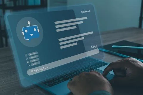 Hands typing on laptop keyboard while engaging with AI assistant interface .. Fotos Stock