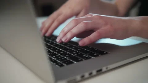 Hands typing on laptop keyboard, working on tablet computer. Stock Footage 143766625