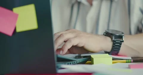 Hands Typing on Laptop in Office Setting 스톡 동영상 323586693