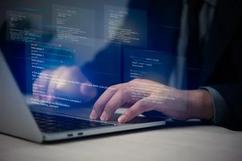 Hands typing on laptop with programming code on screen, representing softwa.. Stock Photos