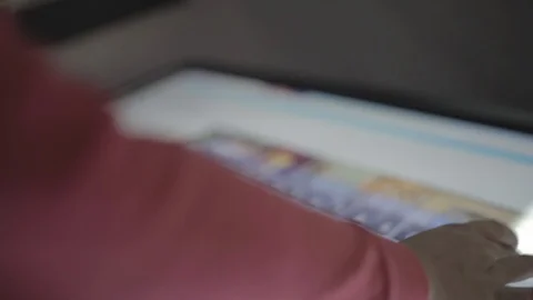 Hands typing on a large touch screen table Stock Footage 114836907
