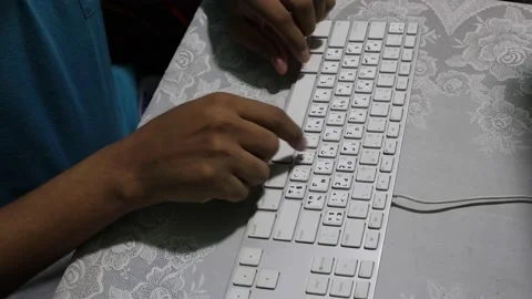 Hands Typing On A Mac Keyboard 스톡 동영상 130318579