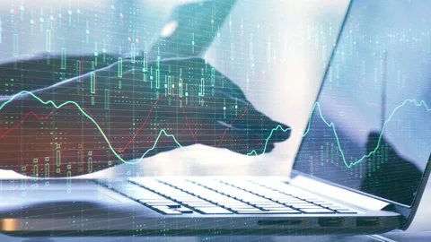 Hands typing on notebook with forex Stock Footage 99701893