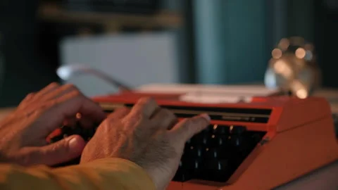 Hands Typing on an Old Vintage Typewriter Machine Stock Footage 318529432