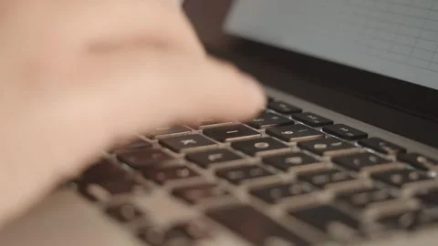 Hands Typing on Silver Laptop Keyboard with Screen Display 库存影片 334641839